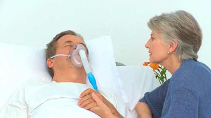 stock-footage-woman-paying-her-sick-husband-a-visit-at-the-hospital