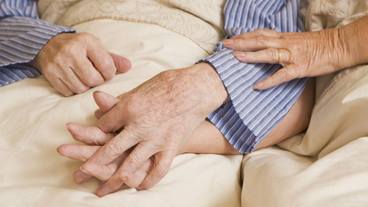 old-couple-sex-bed-holding-hands-story-top