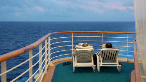 retired couple enjoying cruise vacation