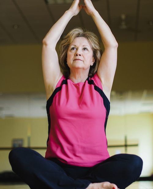 Mature Woman in Prayer Yoga Pose