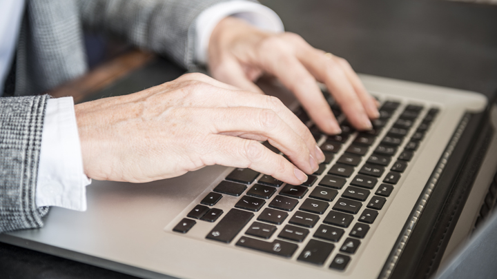 Mature Woman Using Laptop