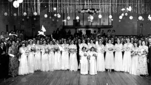 StateLibQld_1_174943_Debutantes_Ball_at_the_Hall_of_Memory,_Goomeri,_1930s