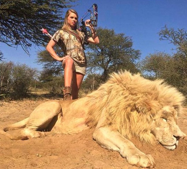 young woman with lion