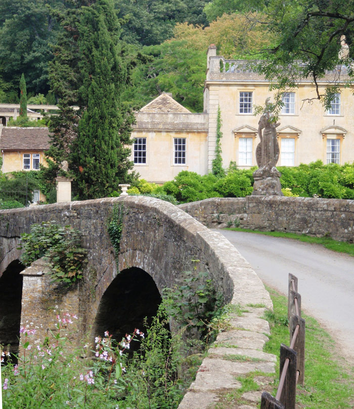 Iford Manor Wiltshire. Britania statue on bridge