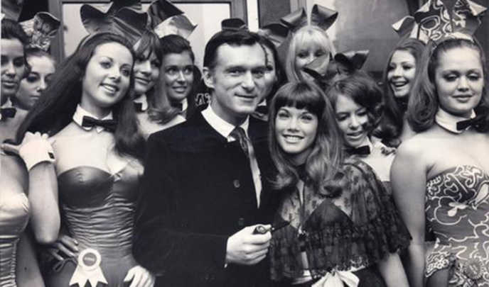 Sixties swinger ... Hugh Hefner poses with his 19-year-old girlfriend Barbara Benton assorted bunnies in 1969 at the Playboy Club in Park Lane, London.