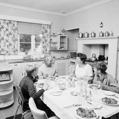 A farming family at dinner in their kitchen WA