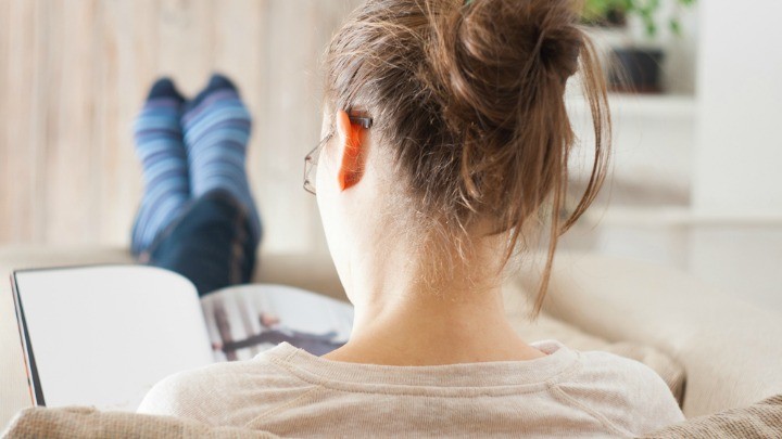 267861689_woman_book_relax_joke Shutterstock