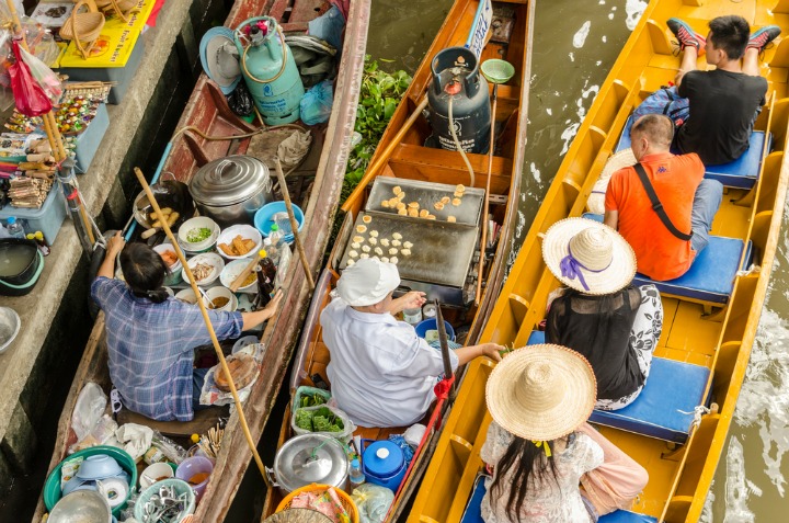 Pick up some goods at the floating markets. 