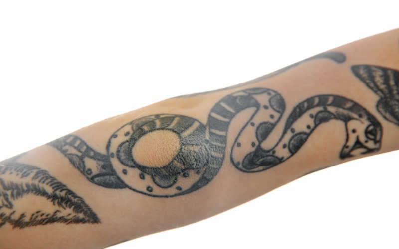 Would a snake tattoo like this really look good all the way up Helen's arm?