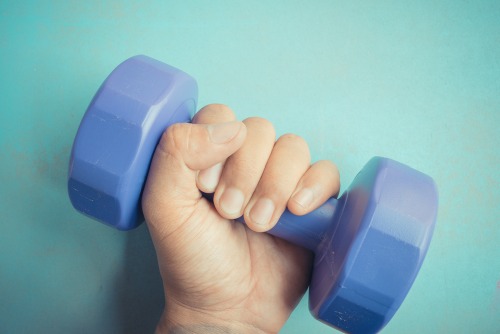 Pick up some hand weights for an easy way to up the anti. 