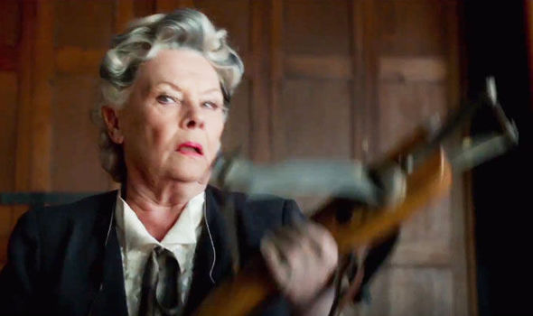 Judy-Dench-with-a-crossbow-703868