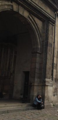 Exterior of Eglise St. Germain-des-Pres. Is this woman waiting for God-ot? Courtesy Catherine Urbanski