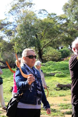 A lesson in boomerang throwing. Photo courtesy Gillian Johnston.