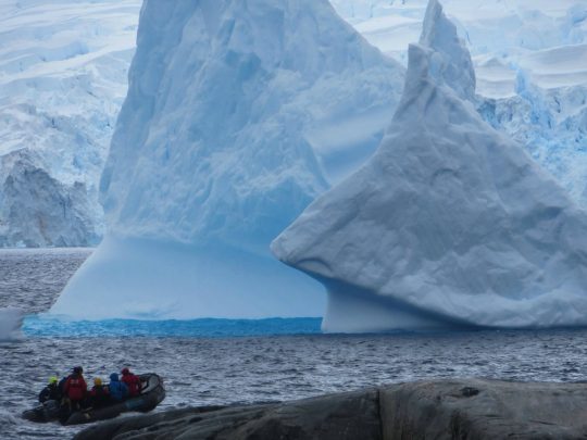 Winding our way through spectacular icebergs in a Zodiac. Photo courtesy Dale Jacobsen.