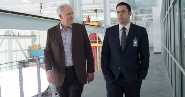 John Lithgow and Ben Affleck in a scene from The Accountant.