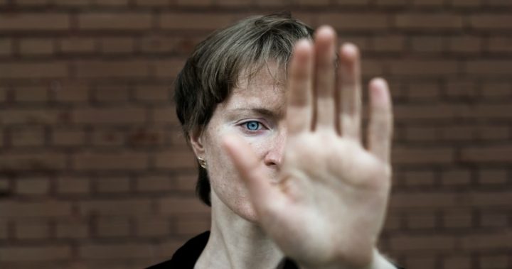 woman-wth-hand-up-stop-abuse_161111