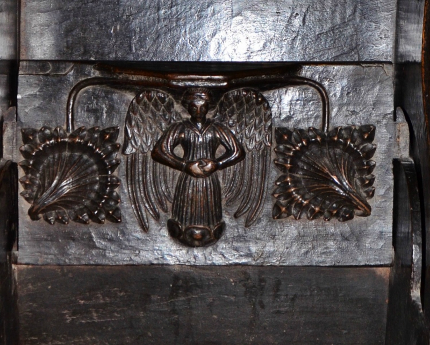 A photograph of the detail of the misericords under choir seats at St Mary's Cathedral. Photo courtesy Lorraine Parker.