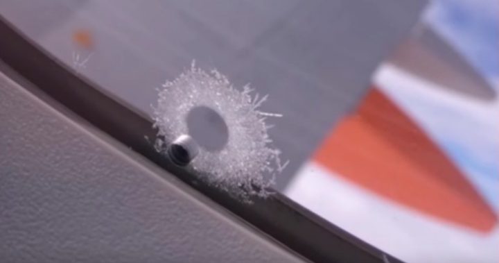 Ever wondered what that hole in the airplane window is really for? Here's your answer... (Photo: YouTube @Jericho).