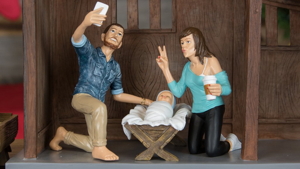 Joseph and Mary pose for a selfie to mark the arrival of their son, Jesus, in this modern-day take on the nativity scene. Photo Modern Nativity.