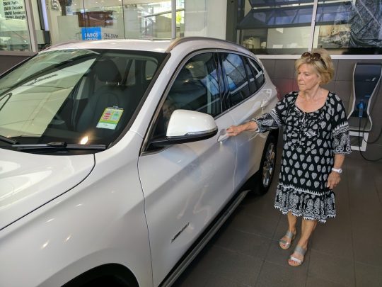 Margaret Pelton test driving a BMW X1