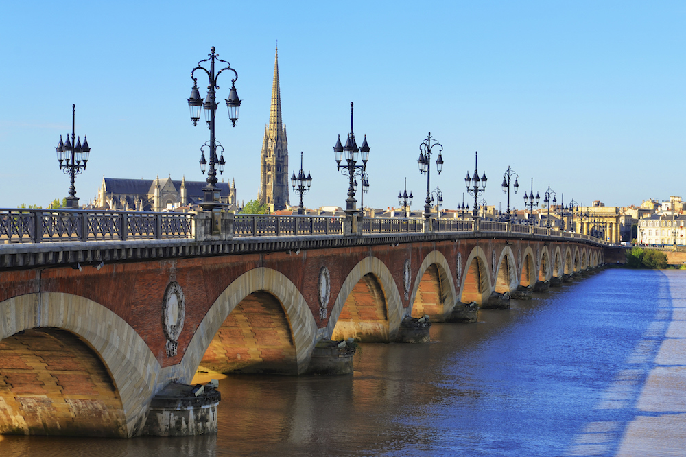 Bordeaux river bridge with St Michel cathedral in background