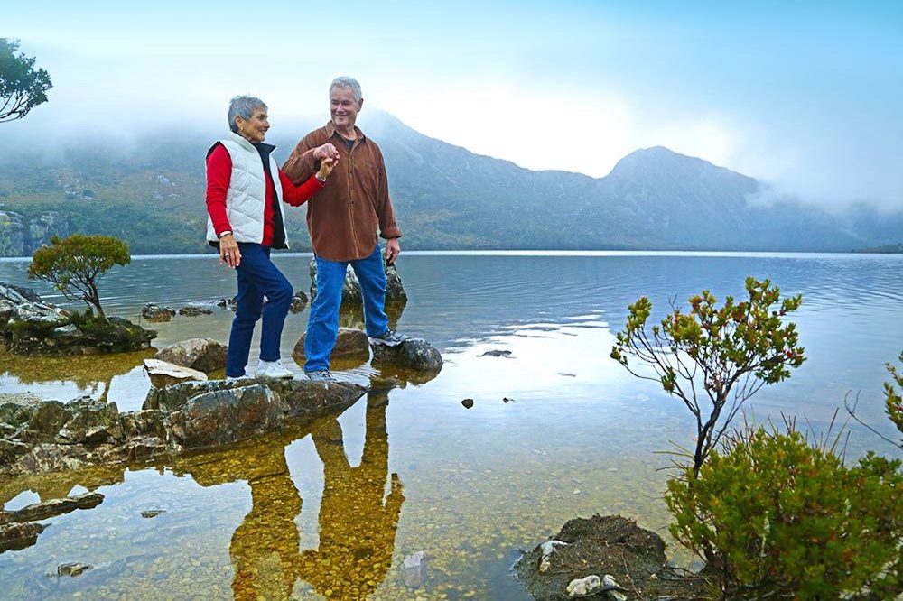 A couple explores the Tasmanian wilderness