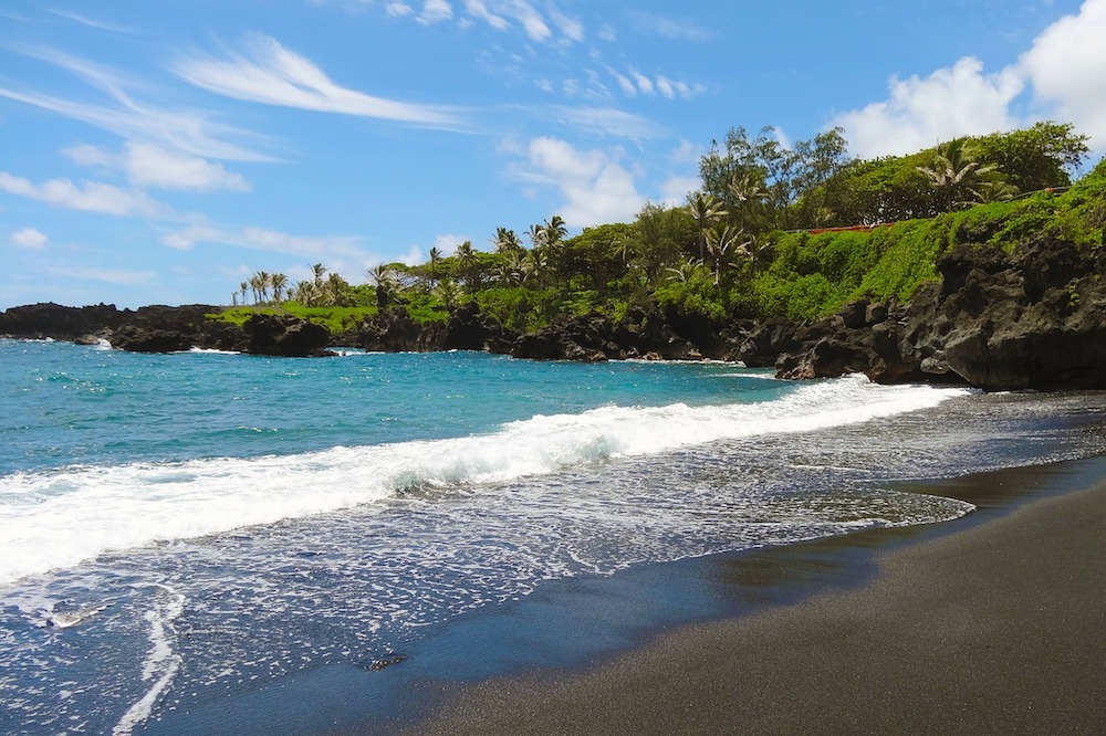 A black sand beach along the Road to Hana