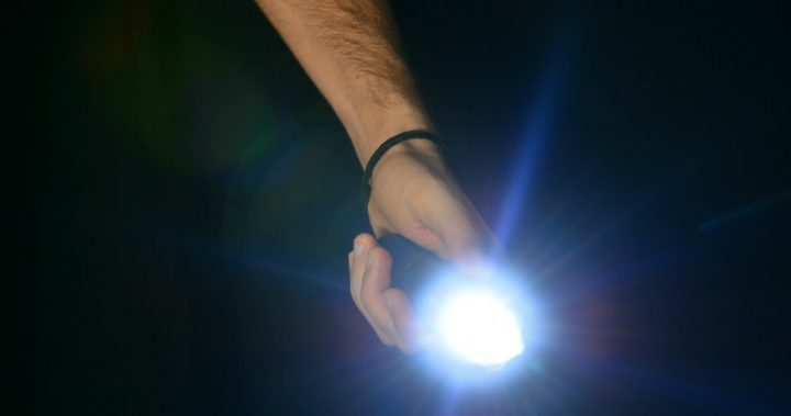 17.7 torch man holding torch