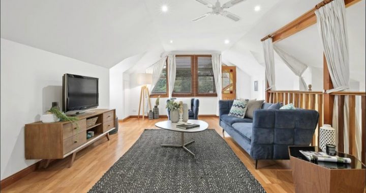 Casual master living area of 17 Alexandra Road, Glebe.