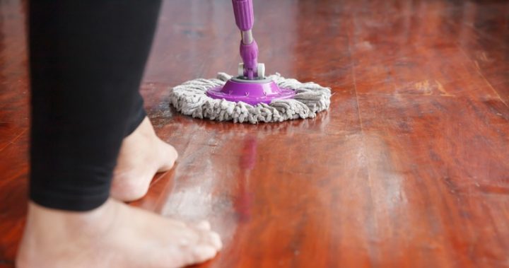 mopping floor Woman mopping floor