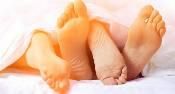210817 bedroom feet Couple in bed.