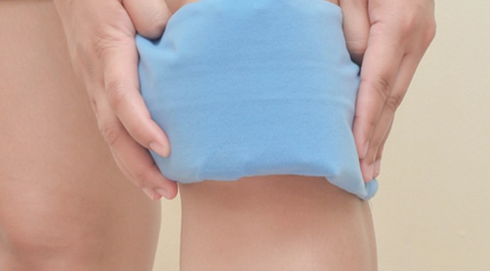 woman using heat pack