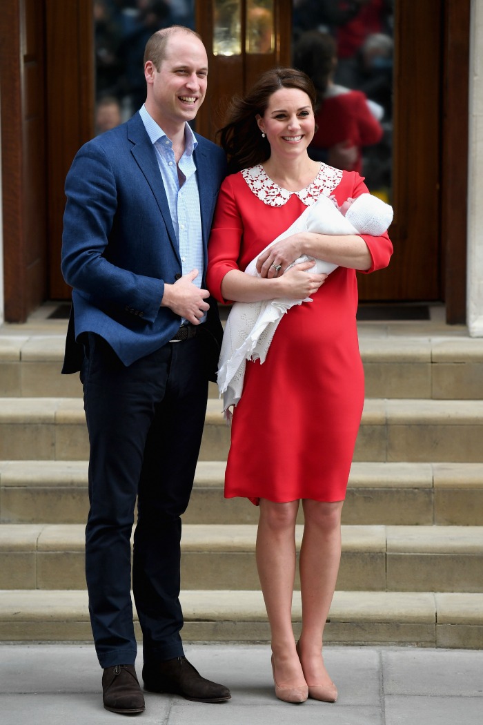 Catherine, Duchess of Cambridge and Prince William, Duke of Cambridge depart the Lindo Wing with their newborn son.