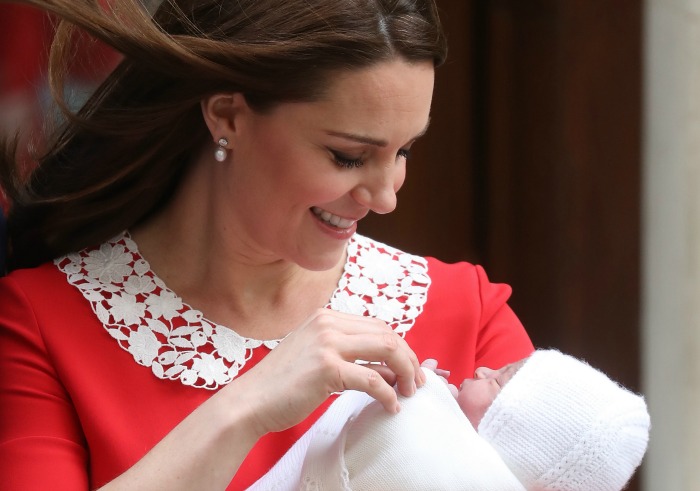 catherine holding new baby