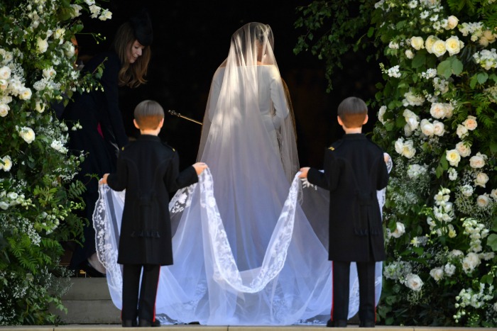 A paige boy held Meghan's veil as she made her way into the chapel.