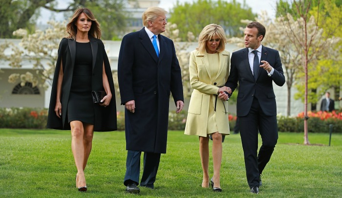 Melania and Donald Trump joined a stylish Brigitte Macron and husband Emmanuel on the lawn of the White House on April 23. Source: Getty