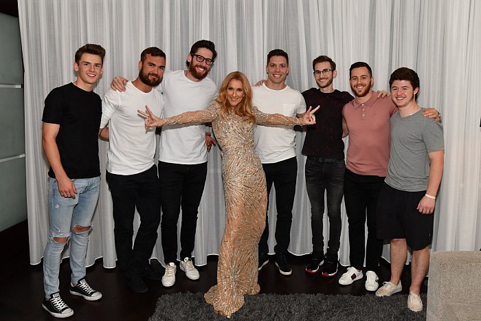Celine Dion poses with the Vegas Golden Knights hockey team.