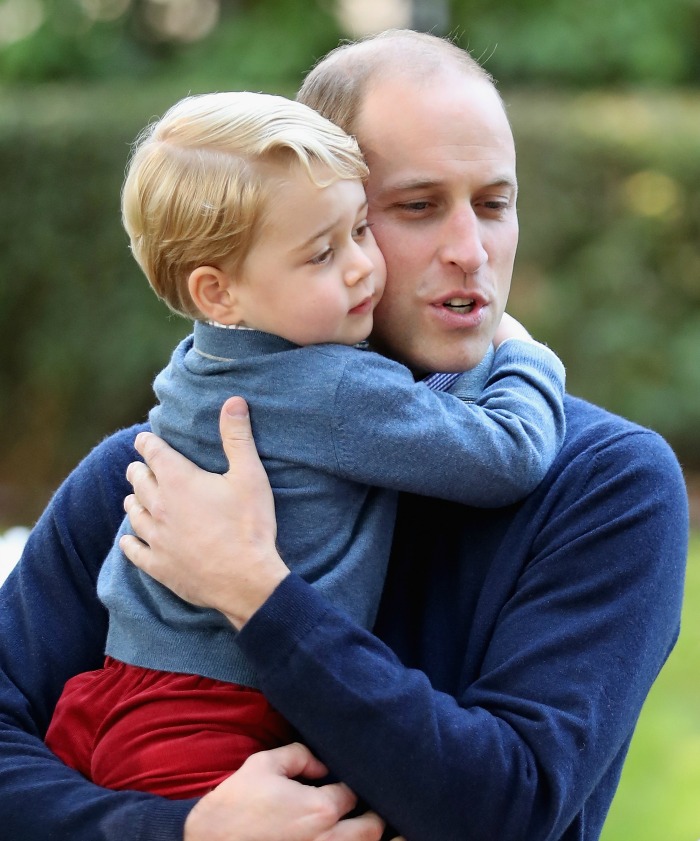 Royalists say Prince George is looking more like his father each day. 