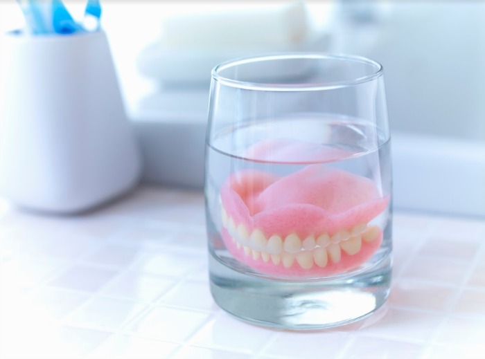 the best way to clean dentures