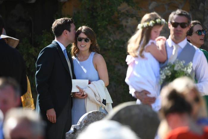 Jack Brooksbank gives Eugenie a kiss at the wedding of Charlie van Straubenzee and Daisy Jenks.