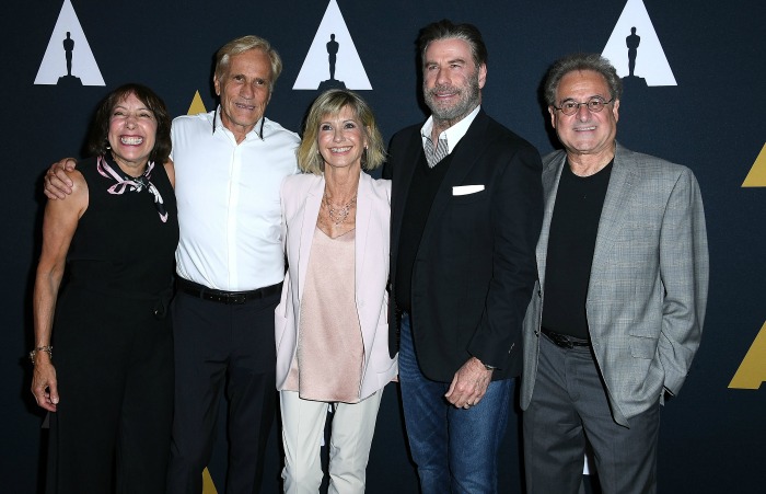 Grease is still the word! Olivia Newton-John stuns for reunion with co