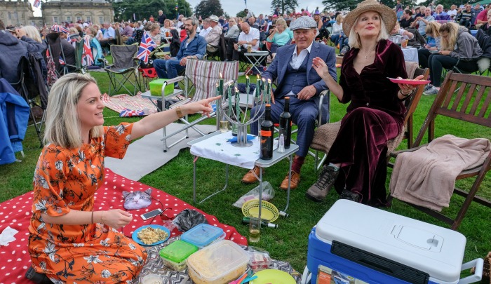 Picnic blanket? Check. Esky? Check. Candelabra? Err, check! Source: Getty