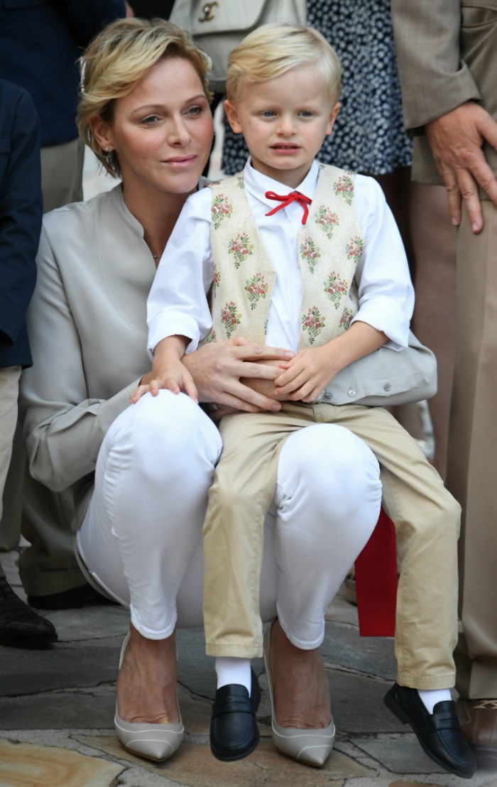 Prince Jacques sat on his mother's knee. Source: Getty.