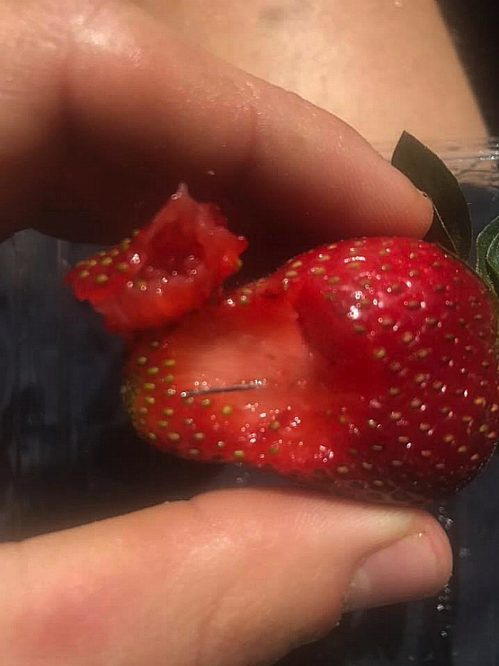 Urgent recall after needle found inside Woolworths strawberries