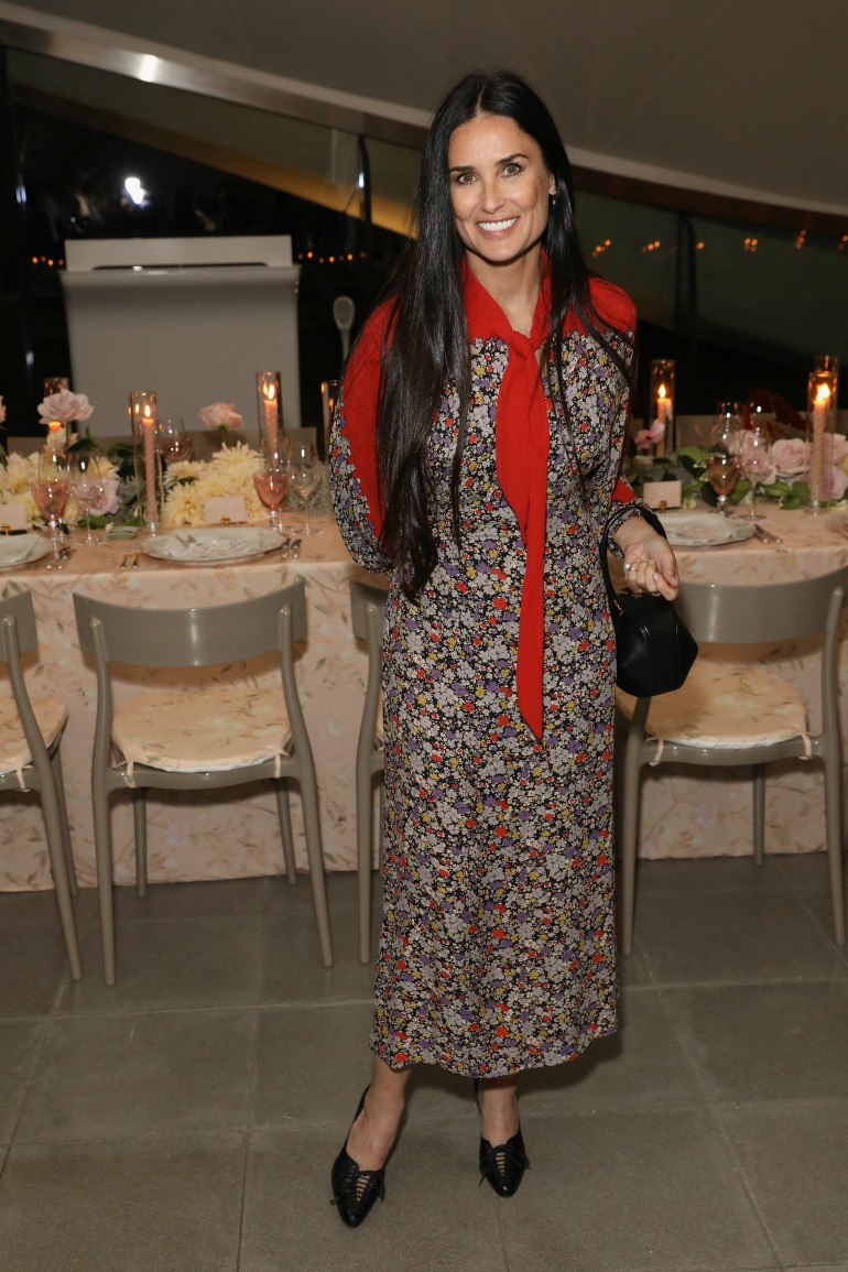 Demi Moore was all smiles in a floral-patterned dress as she attended the Goop launch party in London on Monday. Source: Getty