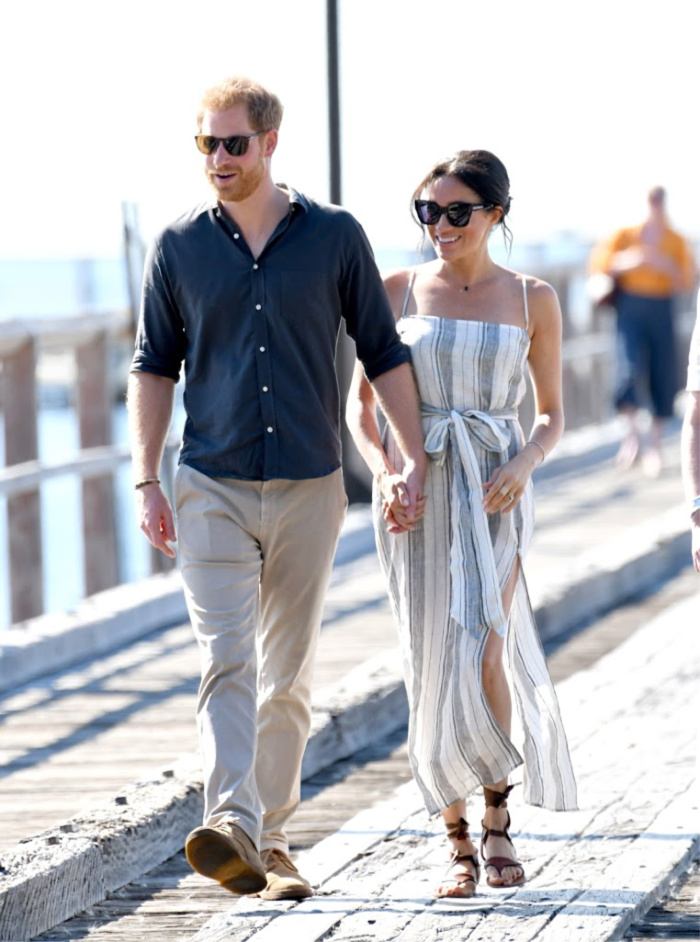 The Duke and Duchess of Sussex wander down the jetty on Fraser Island to meet with fans. 