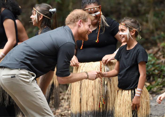 Prince Harry greets local children on Fraser Island. 