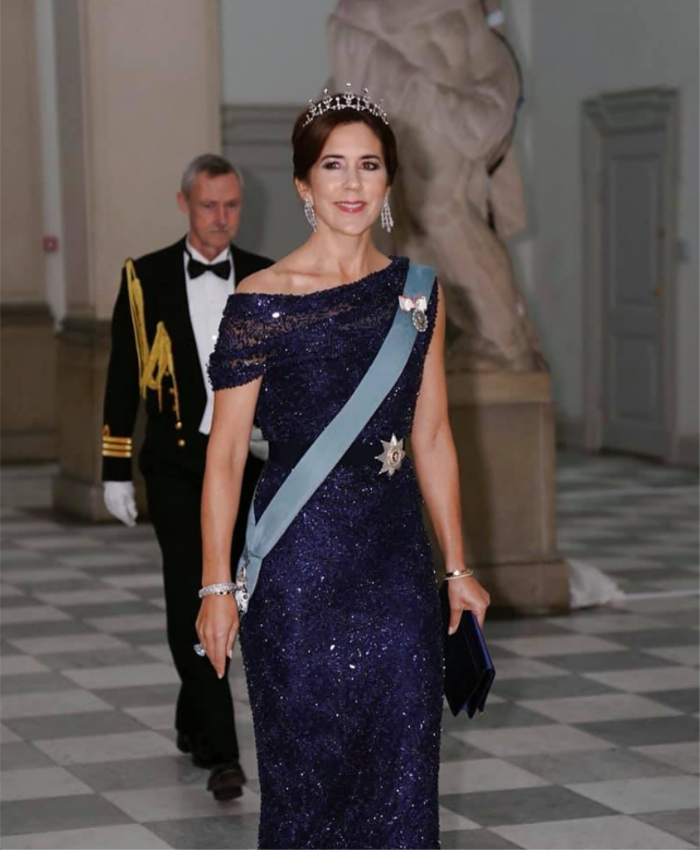 Princess Mary glowed in a stunning blue, sparkly gown.