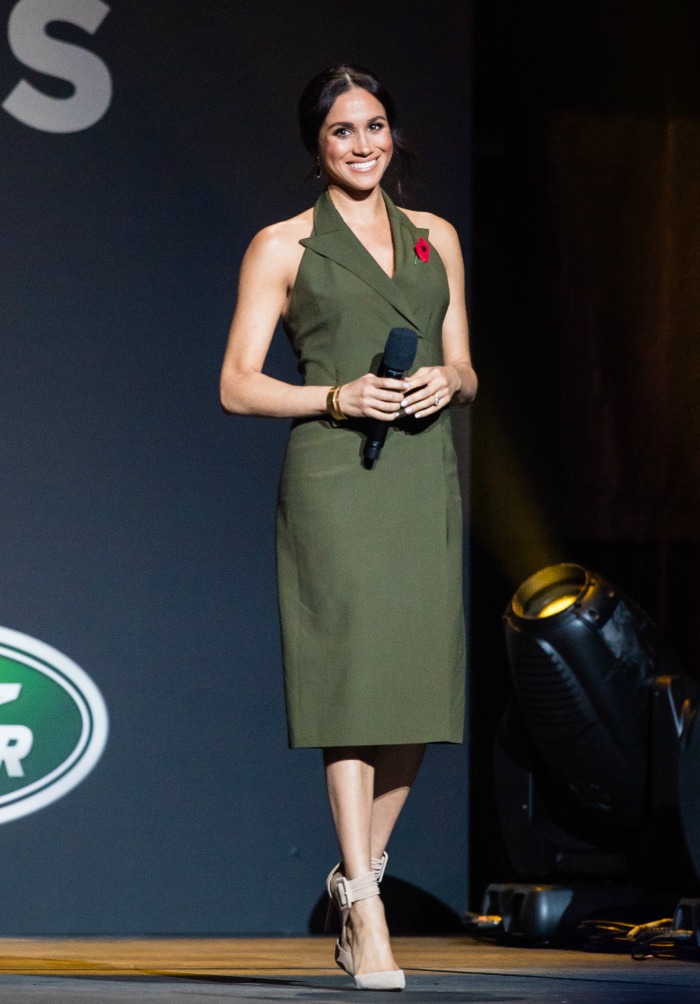 Meghan stunned in a green halter-neck dress. Source: Getty.