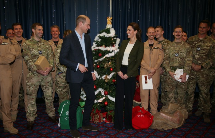 Catherine gave her husband a loving look as they laughed together by the tree. Source: Getty.